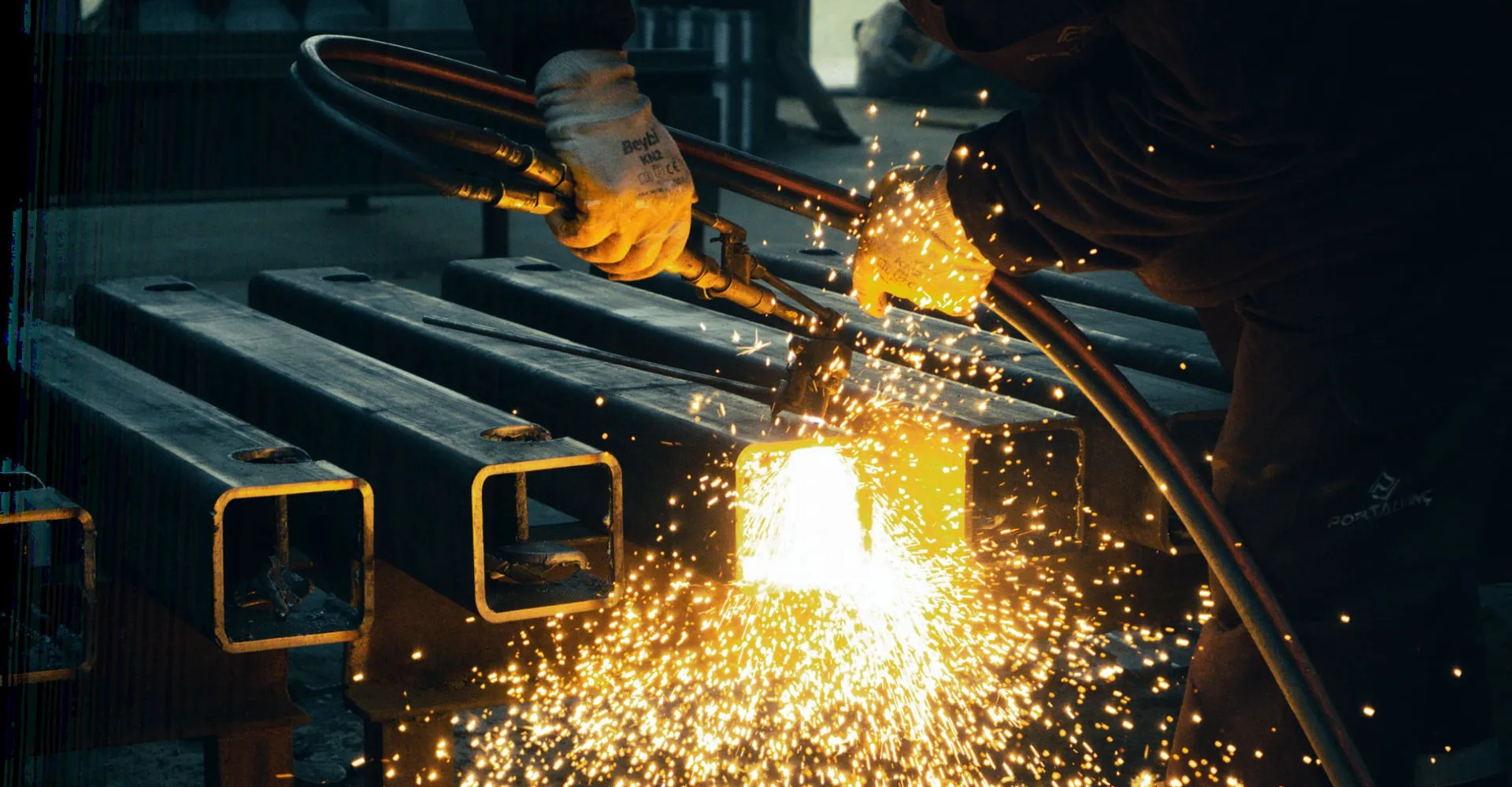 Sparks flying from a welder at work